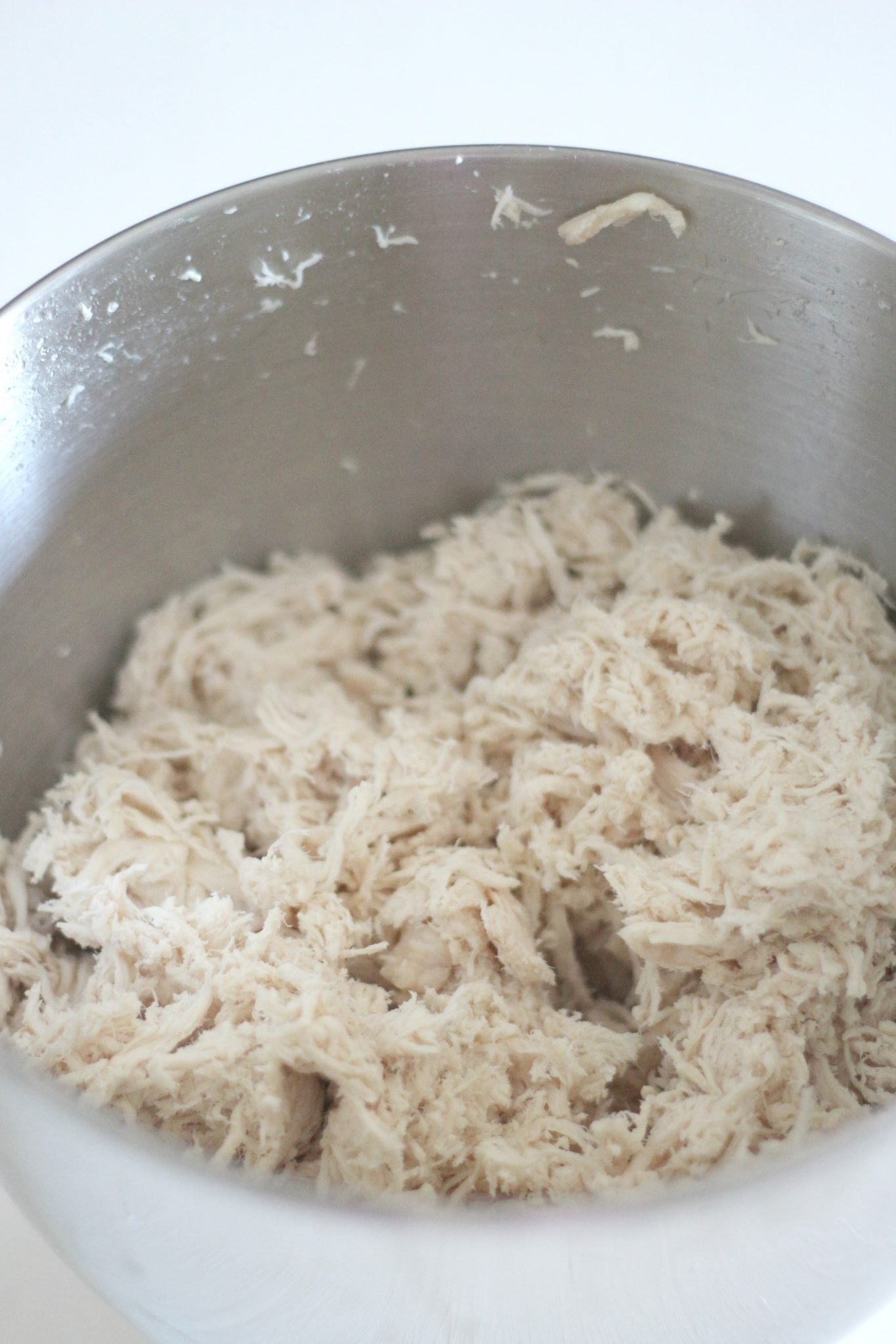 Slow Cooker Shredded Chicken Breast is an easy way to prepare chicken and to have it ready to go for the week. It's perfect for the meal prep for a low carb diet.