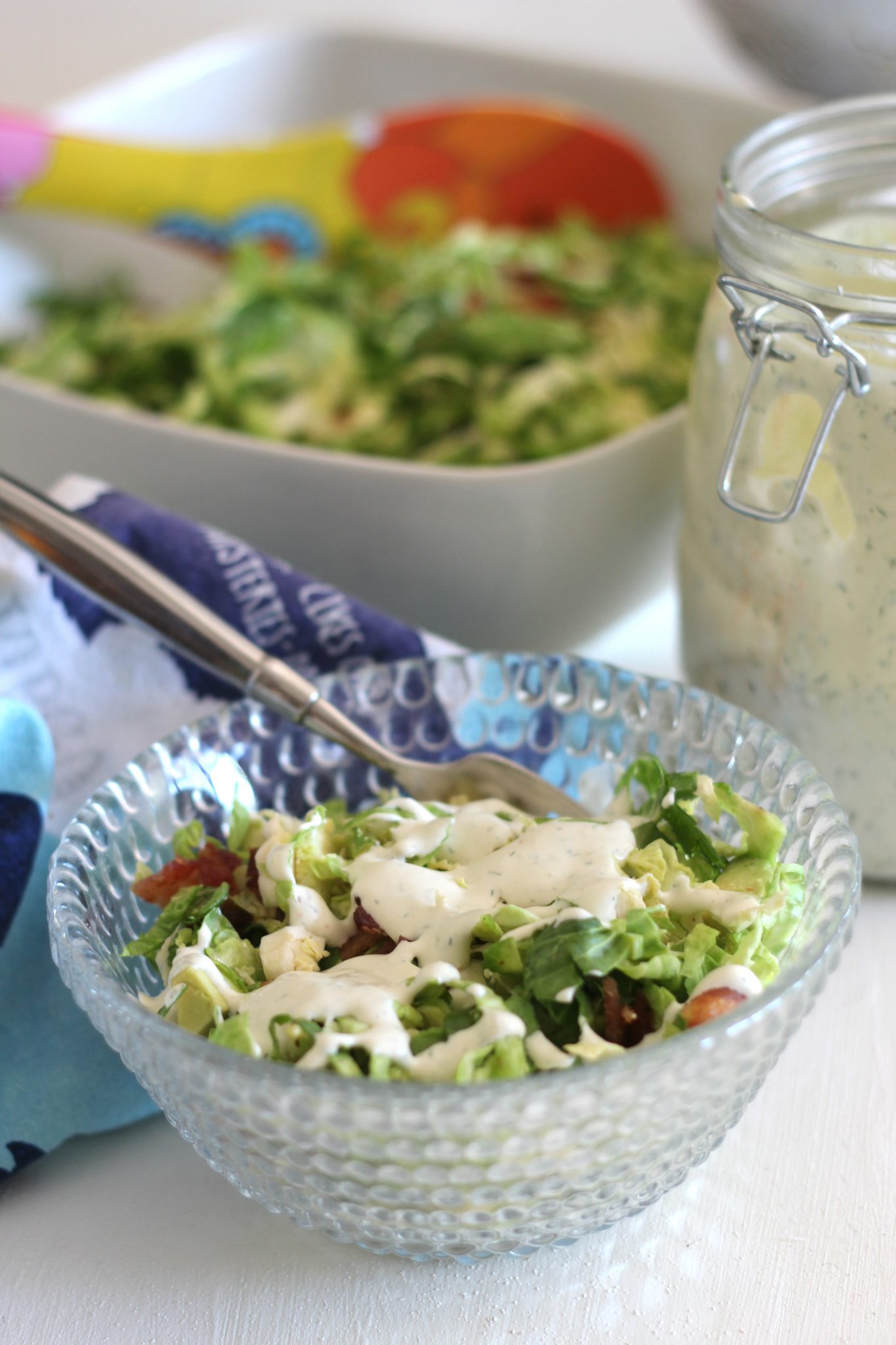 Brussels sprouts, avocado and bacon salad with creamy dill dressing