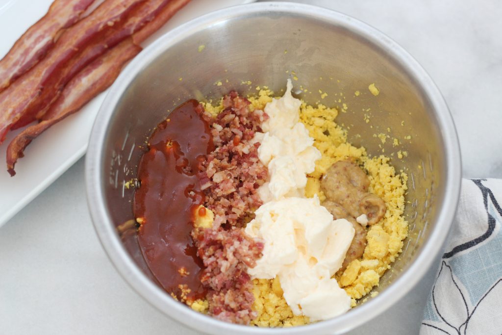 This is not your basic deviled egg recipe! These spicy bacon deviled eggs are so delicious and perfectly low carb!