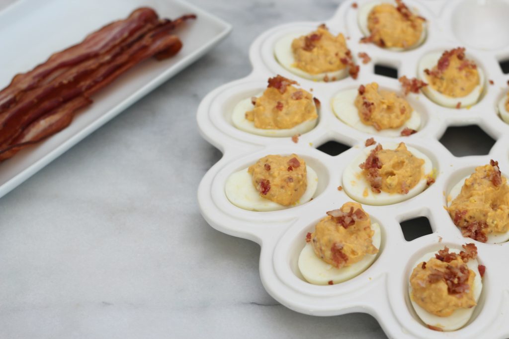 This is not your basic deviled egg recipe! These spicy bacon deviled eggs are so delicious and perfectly low carb!