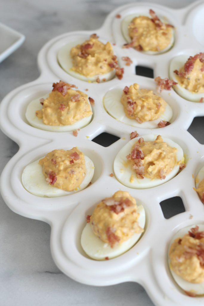 This is not your basic deviled egg recipe! These spicy bacon deviled eggs are so delicious and perfectly low carb!