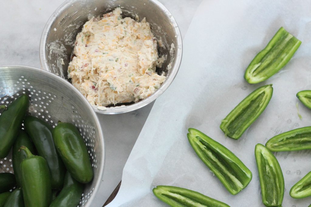 You are going to love this recipe for roasted chicken and bacon jalapeño poppers! These are perfect low carb/keto appetizers and they taste amazing. #lowcarbrecipes #chicken #jalapenopoppers #ketorecipes