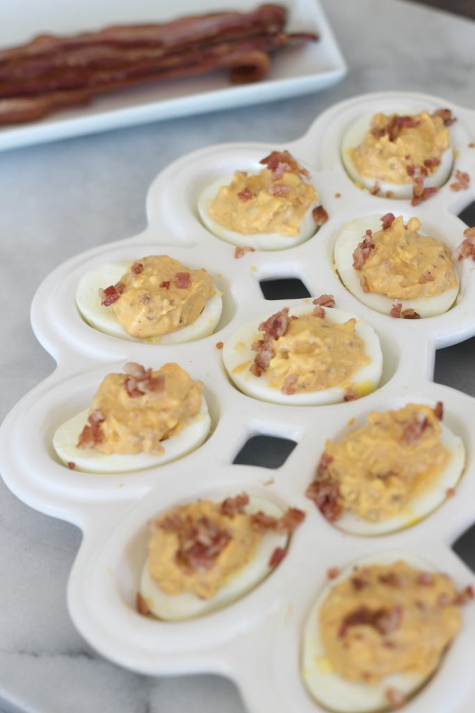 This is not your basic deviled egg recipe! These spicy bacon deviled eggs are so delicious and perfectly low carb!