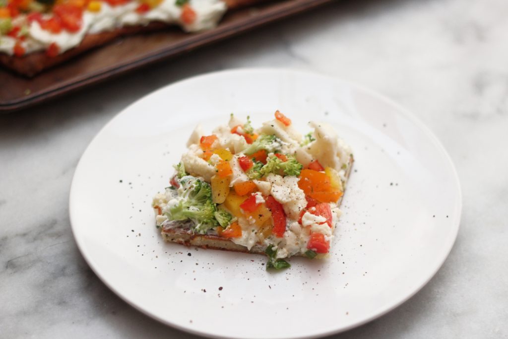 Looking for a yummy but low carb appetizer? Look no further! This low carb cold veggie pizza recipe is a healthier take on a traditional carb laden recipe! #lowcarb #keto #vegetables #fathead #lowcarbappetizer #cauliflower #broccoli #bellpeppers #ranch low carb cold veggie ranch pizza