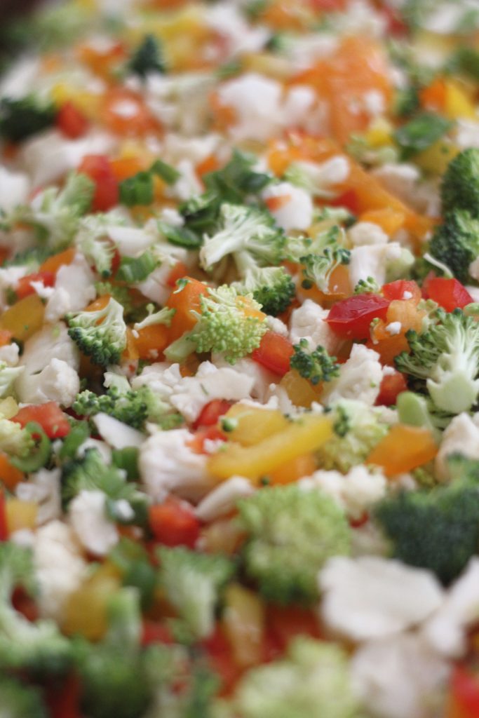 Looking for a yummy but low carb appetizer? Look no further! This low carb cold veggie pizza recipe is a healthier take on a traditional carb laden recipe! #lowcarb #keto #vegetables #fathead #lowcarbappetizer #cauliflower #broccoli #bellpeppers #ranch low carb cold veggie ranch pizza