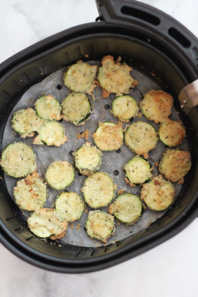 Air fryer fried parmesan zucchini. Fun appetizer and fun to make! #lowcarb #keto #ketoairfryer #friedzucchini