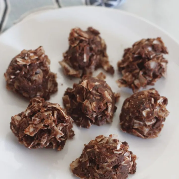 Chocolate coconut frozen nut butter bites! These delicious little fat bombs are perfect to keep in the freezer for those moments that you need a sweet snack. #lowcarbdelish #ketodesserts #fatbombs #chocolatepeanutbutterbites #lowcarbdesserts #ketorecipes