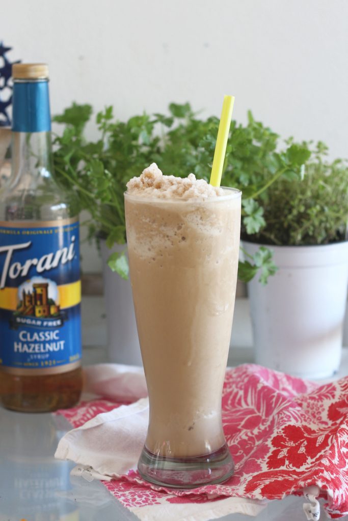 This delicious Hazelnut Keto Coffee Frappé is sugar-free and dairy-free and a perfect summer replacement for your hot bulletproof coffee. #lowcarbdelish #ketocoffee #bulletproofcoffee #buttercoffee #ketorecipes #ketocoffee