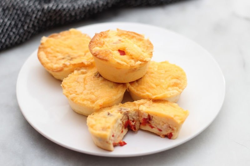 These keto bacon, bell pepper and cheddar eggs bites are great for breakfast or a post workout snack. Only one carb per egg bite!
