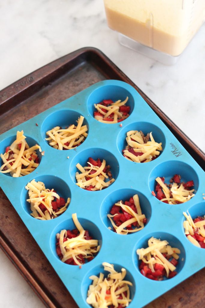 These keto bacon, bell pepper and cheddar eggs bites are great for breakfast or a post workout snack. Only one carb per egg bite!