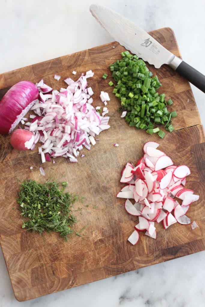 chopped onion, radishes, dill and green onions