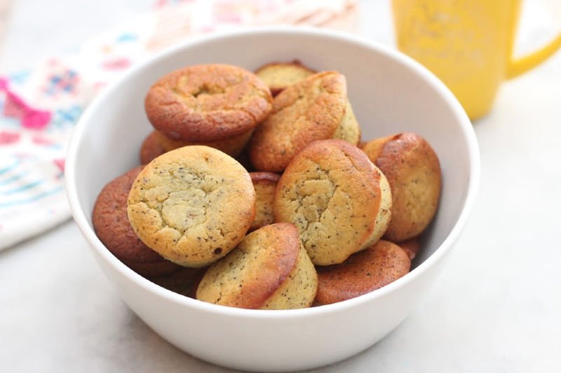 These flavorful keto poppy seed muffins are perfect for your next brunch! Under two net carbs a piece, they are super moist and easy to make. Flavor with lemon or almond to truly make them special! #lowcarbdelish #ketobrunch #ketorecipes #lupinflour #alluloserecipes #ketomuffins #lowcarbrecipes