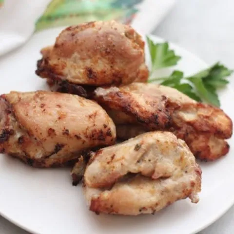 air fried lemon chicken thighs on a plate