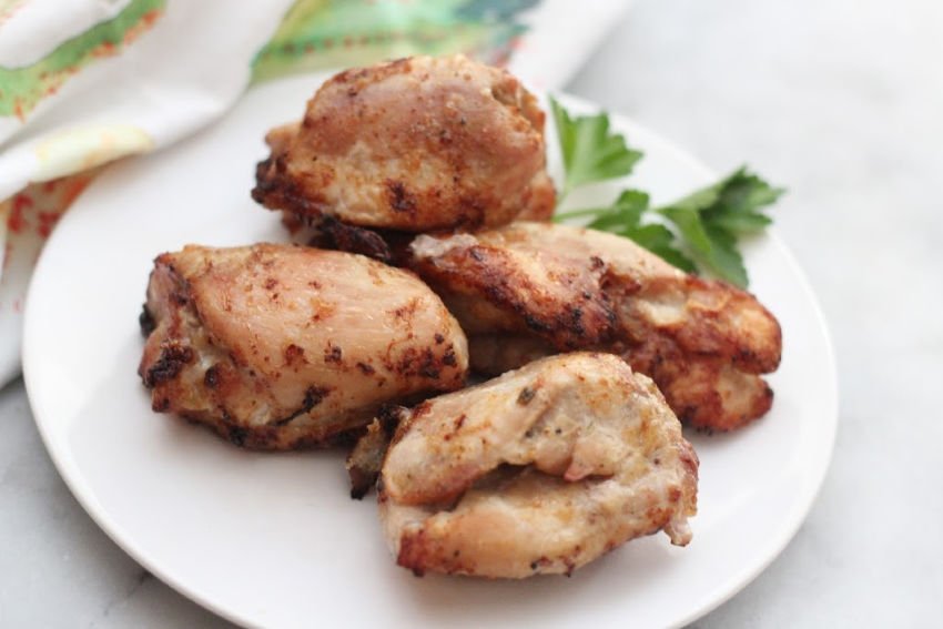 Air fried lemon pepper chicken thighs have a hint of lemon flavor make an easy weeknight dinner and have a taste that everyone loves. #lowcarbdelish #ketodinner #airfryerrecipes #airfryerketo #lowcarbrecipes #chickendinner #weeknightmeals