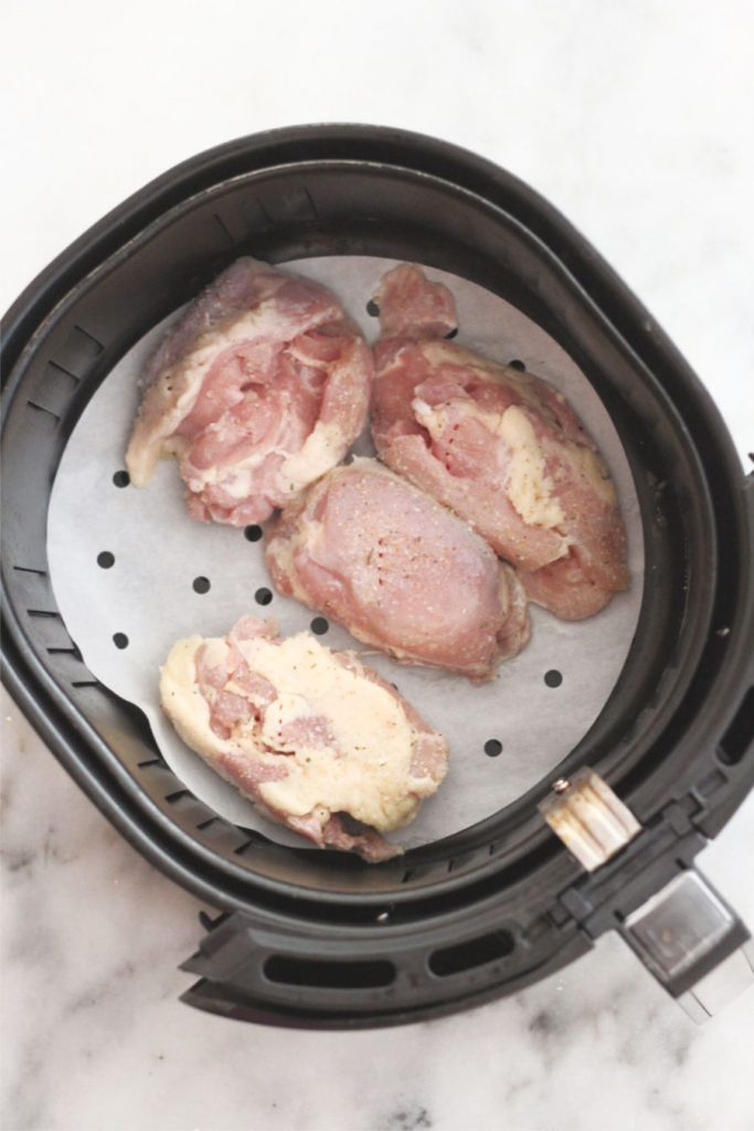 Air fried lemon pepper chicken thighs have a hint of lemon flavor make an easy weeknight dinner and have a taste that everyone loves. #lowcarbdelish #ketodinner #airfryerrecipes #airfryerketo #lowcarbrecipes #chickendinner #weeknightmeals