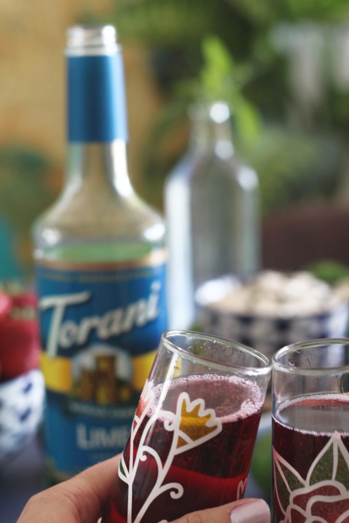 Two glasses of Sugar Free Hibiscus Tea and Lime Sparkling Cocktail